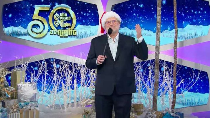 Drew Carey, wearing a Santa hat, hosts a holiday edition of The Price Is Right At Night for CBS